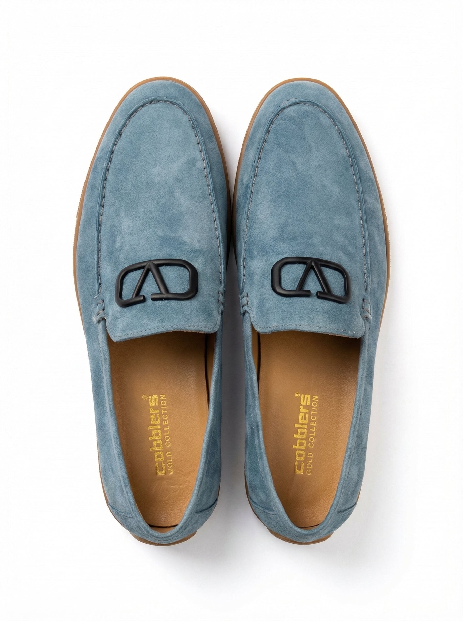Pair of blue suede loafers with a visible brand logo on a white background